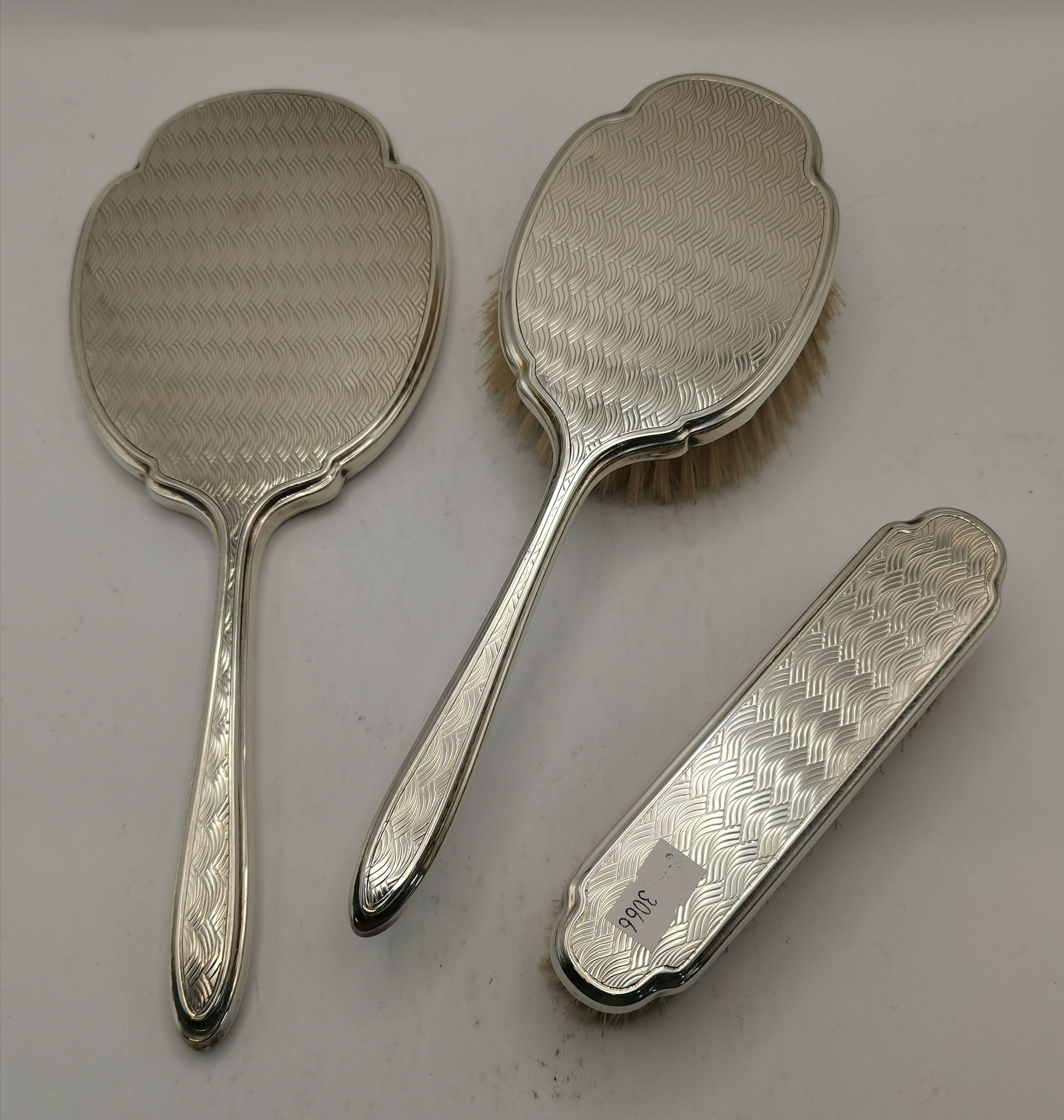 An Elizabeth II silver dressing table brush and mirror set, and a letter opener - Image 2 of 5