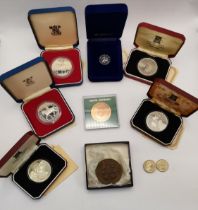 A group of silver proof coins