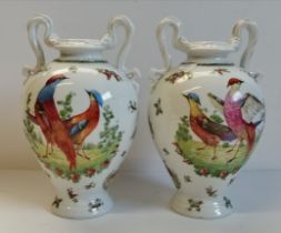 A pair of Victoria Pottery twin-handled Pheasant pattern vases