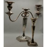 A George V silver candlestick and a silver-plated three-light candelabrum