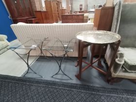 Pair of glass and metal side tables plus round brass tray table