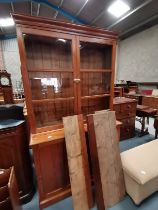 An Antique pitch pine school bookcase in two parts