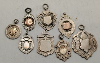 Eight silver fob medals