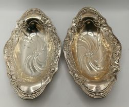 A pair of Art Nouveau American sterling silver dishes