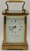 An English brass carriage clock by Matthew Norman, London