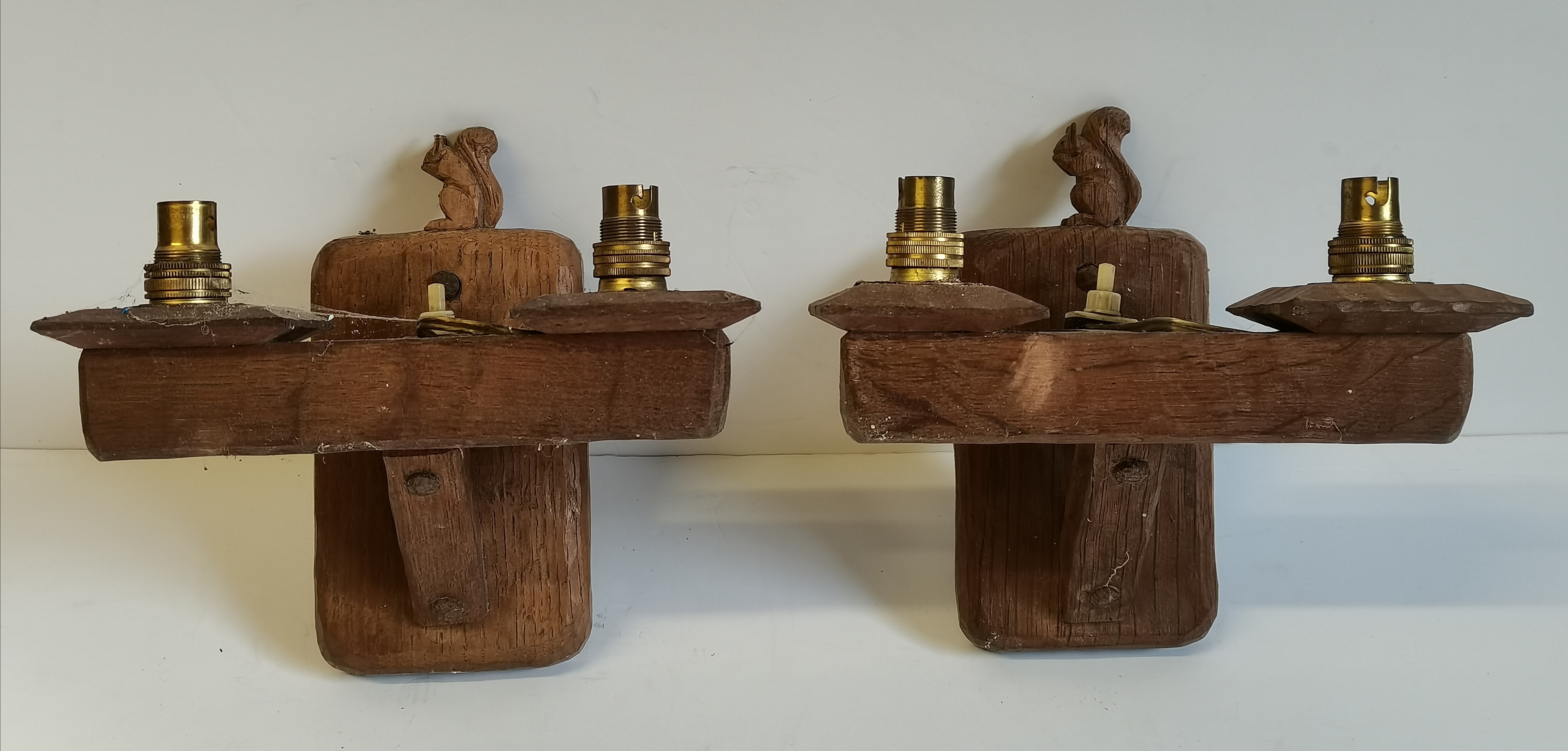 Wilfred Hutchinson, a pair of Squirrelman twin-light wall brackets