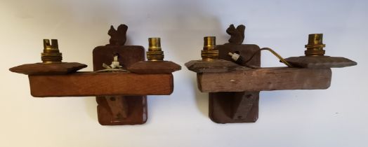 Wilfred Hutchinson, a pair of Squirrelman twin-light wall brackets