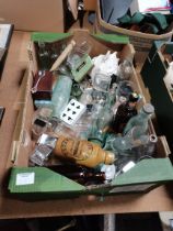 1 Box of Miscellaneous Containing Bottles, A Shell Cufflinks And Weights