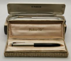 An original Parker '51' fountain pen, and two others with 14k nibs