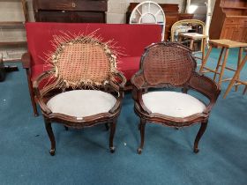 A Pair of Early Victorian Double caned Bergere armchairs