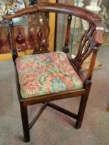 A yewood corner chair with chippendale splats and