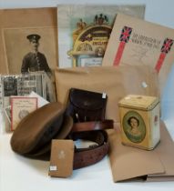 War memorabilia incl. Cap, leather belt, old photographs, vintage tin etc