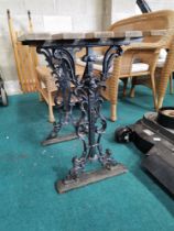 Cast iron and wood slatted potting table