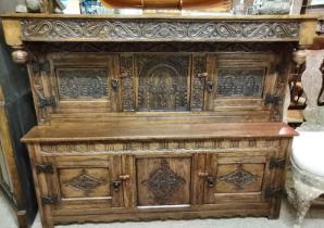 A TITCHMARSH AND GOODWIN solid oak low cupboard