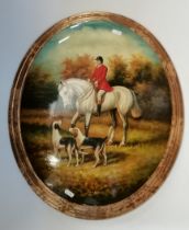 A large domed oval wall plaque