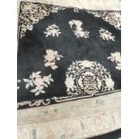 Very Large black and cream Chinese rug