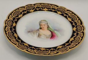 A painted and gilded porcelain cabinet plate