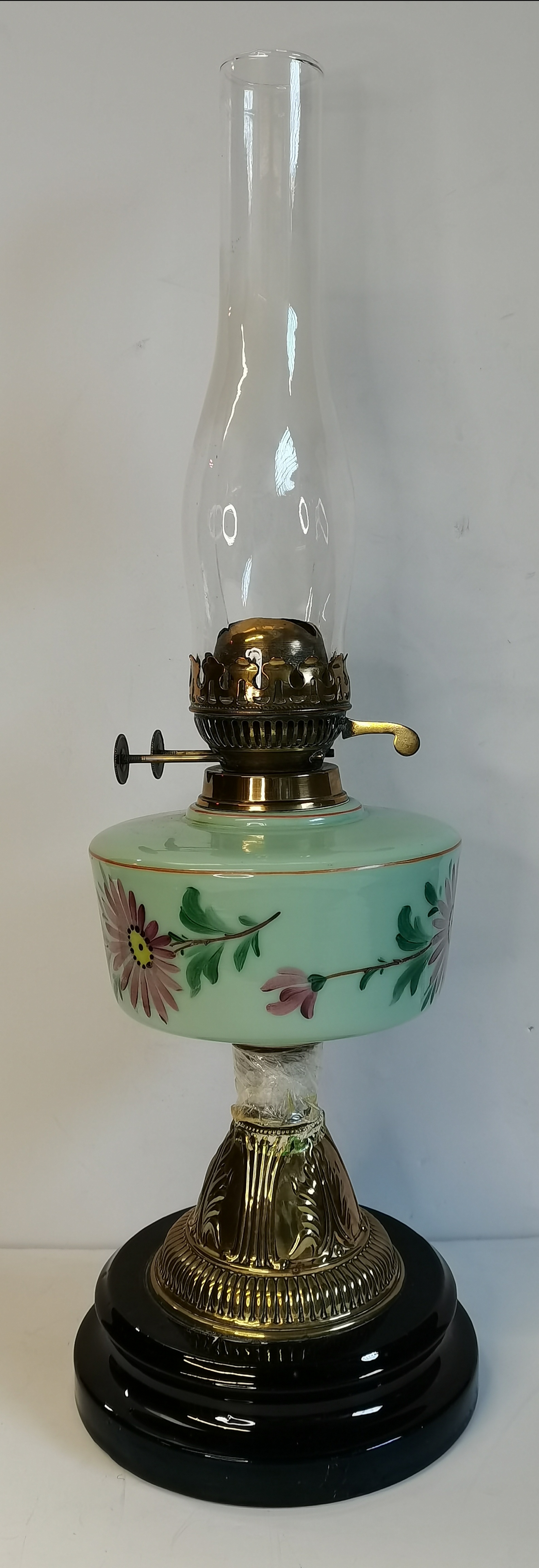 A Victorian glass oil lamp