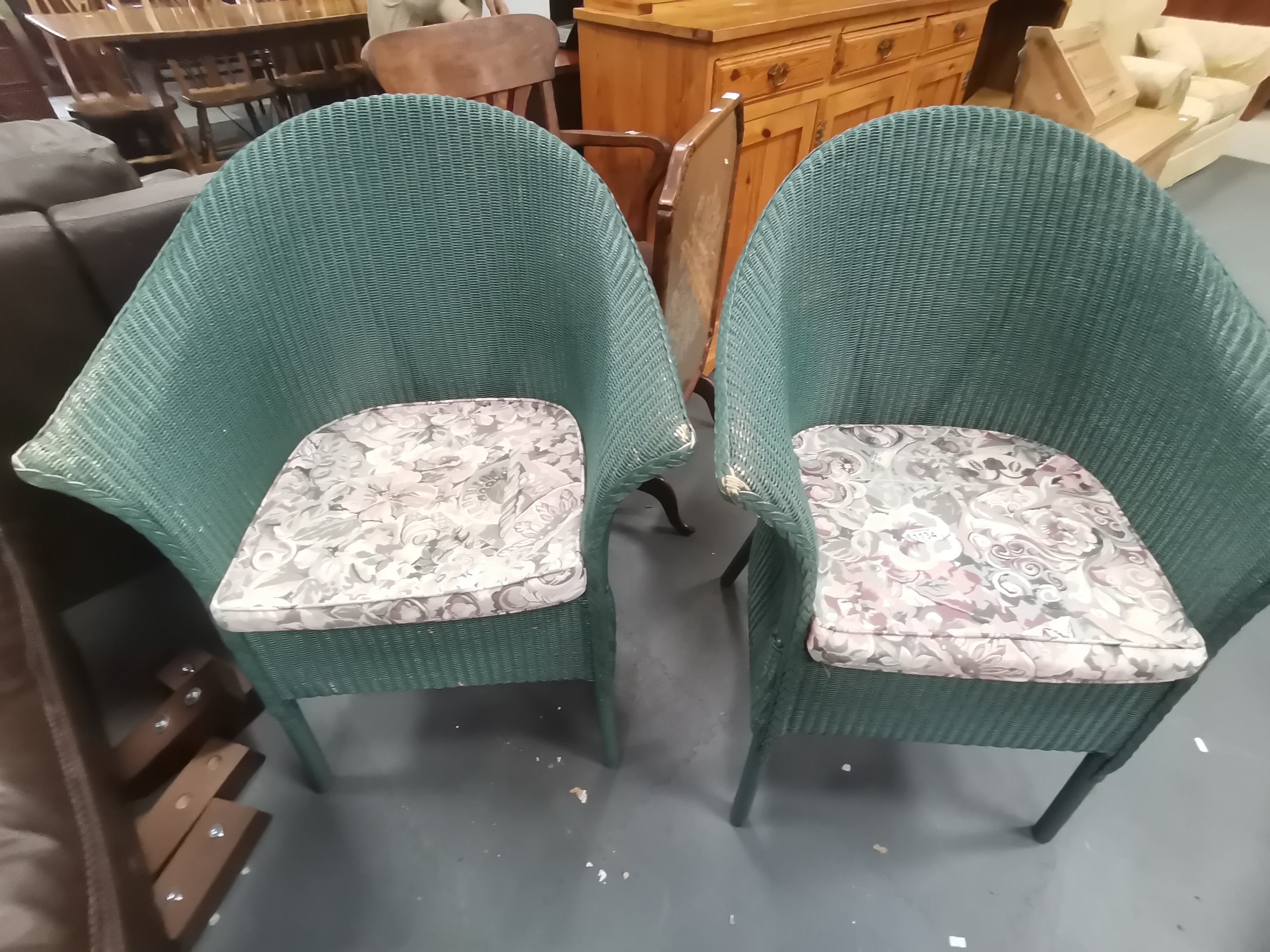 A Pair of green Lloyd Loom chairs