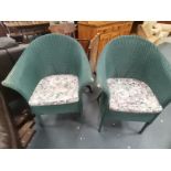 A Pair of green Lloyd Loom chairs