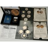 Two WWII commemorative proof coin sets