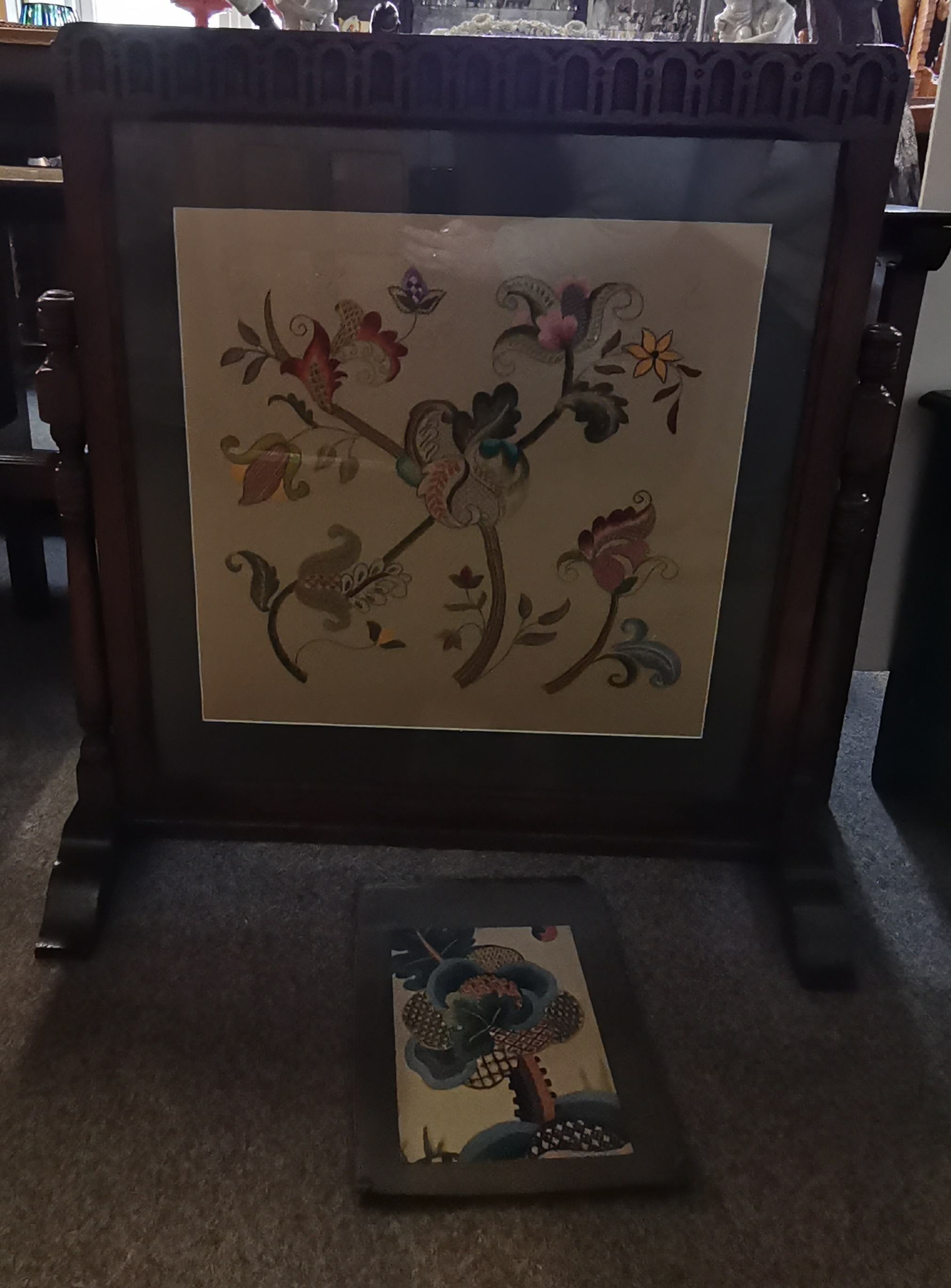 A mid-century oak firescreen with embroidered panel, 1956