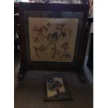 A mid-century oak firescreen with embroidered panel, 1956