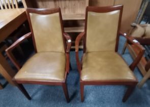 A pair of G PLAN armchairs in original fabric