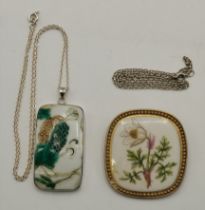 A silver-mounted Chinese porcelain plaque pendant, and a Danish silver-mounted porcelain brooch