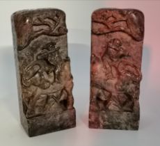 A pair of Chinese soapstone carved scroll weights