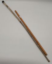 A Victorian shark vertebrae stick, and a 19th Century bamboo swagger stick