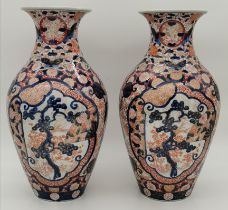 A pair of Japanese Imari vases