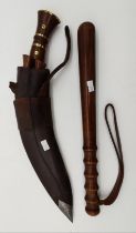 A wooden baton, and a wooden-handled kukri