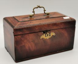 A brass-mounted oak tea caddy