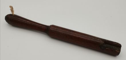 A vintage mahogany baton with lead core