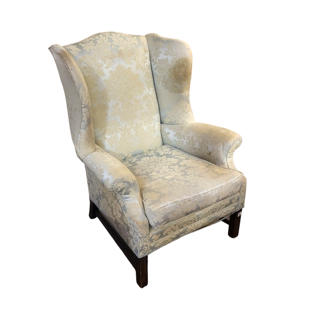 AN EARLY 20TH CENTURY GEORGIAN DESIGN WING ARMCHAIR Floral fabric upholstery complete with loose