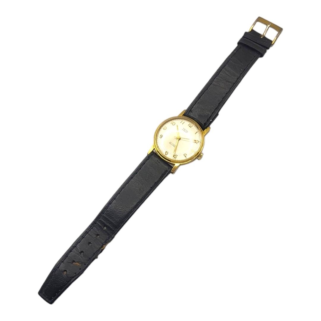 SMITHS, EVEREST, A 1950’S YELLOW METAL CASED GENT’S SLIM WRISTWATCH Having a gold tone dial, - Image 3 of 5
