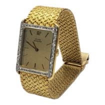 GIRARD PERREGAUX, A VINTAGE 18CT GOLD AND DIAMOND GENTS WRISTWATCH Rectangular form dial with