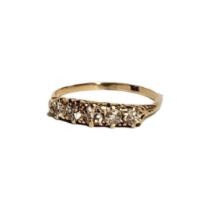 AN EARLY 20TH CENTURY 9CT GOLD AND DIAMOND FIVE STONE RING The single row of round cut diamonds. (