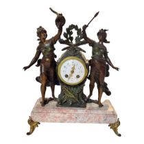 A FRENCH 19TH CENTURY SPELTER AND ROUGE MARBLE FIGURAL CLOCK Two classical female figures with