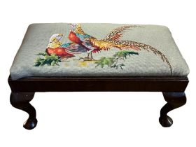 AN EARLY 20TH CENTURY MAHOGANY FOOTSTOOL With tapestry woven drop in seat, pheasants, on cabriole