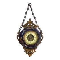 EUGENE FARCOT, A 19TH CENTURY FRENCH GILT METAL AND PORCELAIN WALL CLOCK Having applied urn form