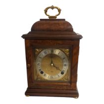 ELLIOT OF LONDON, A 20TH CENTURY WALNUT AND BRASS MANTEL CLOCK Having a single brass handle,square