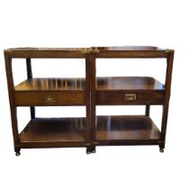 A PAIR OF MILITARY MAHOGANY SIDE TWO TIER SIDE TABLES With brass fittings on bun feet. (48cm x