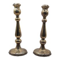 A PAIR OF 20TH CENTURY SILVER CANDLESTICKS Having tapering flutes to body and base. (approx 27cm)