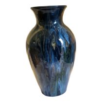 A LARGE EARTHENWARE ART POTTERY LUSTRE BALUSTER VASE, CIRCA 1900 - 1910 Hand thrown vase applied