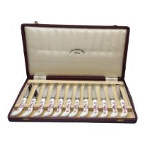 ROYAL CROWN DERBY, A VINTAGE SET OF PORCELAIN HANDLED DESSERT KNIVES Of pistol grip design with