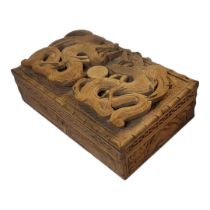 AN EARLY 20TH CENTURY CHINESE-NEPALESE SOFTWOOD RECTANGULAR DOUBLE DRAGON AND PEARL OF WISDOM BOX