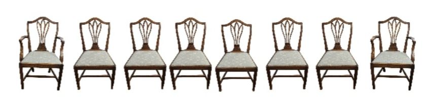 A SET OF EIGHT REGENCY STYLE MAHOGANY DINING CHAIRS With pierced vase splat backs, green and cream