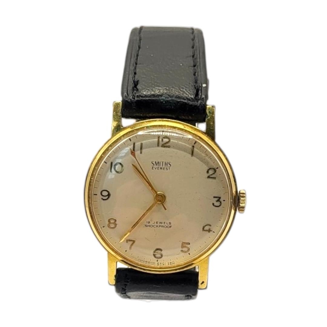 SMITHS, EVEREST, A 1950’S YELLOW METAL CASED GENT’S SLIM WRISTWATCH Having a gold tone dial, - Image 2 of 5